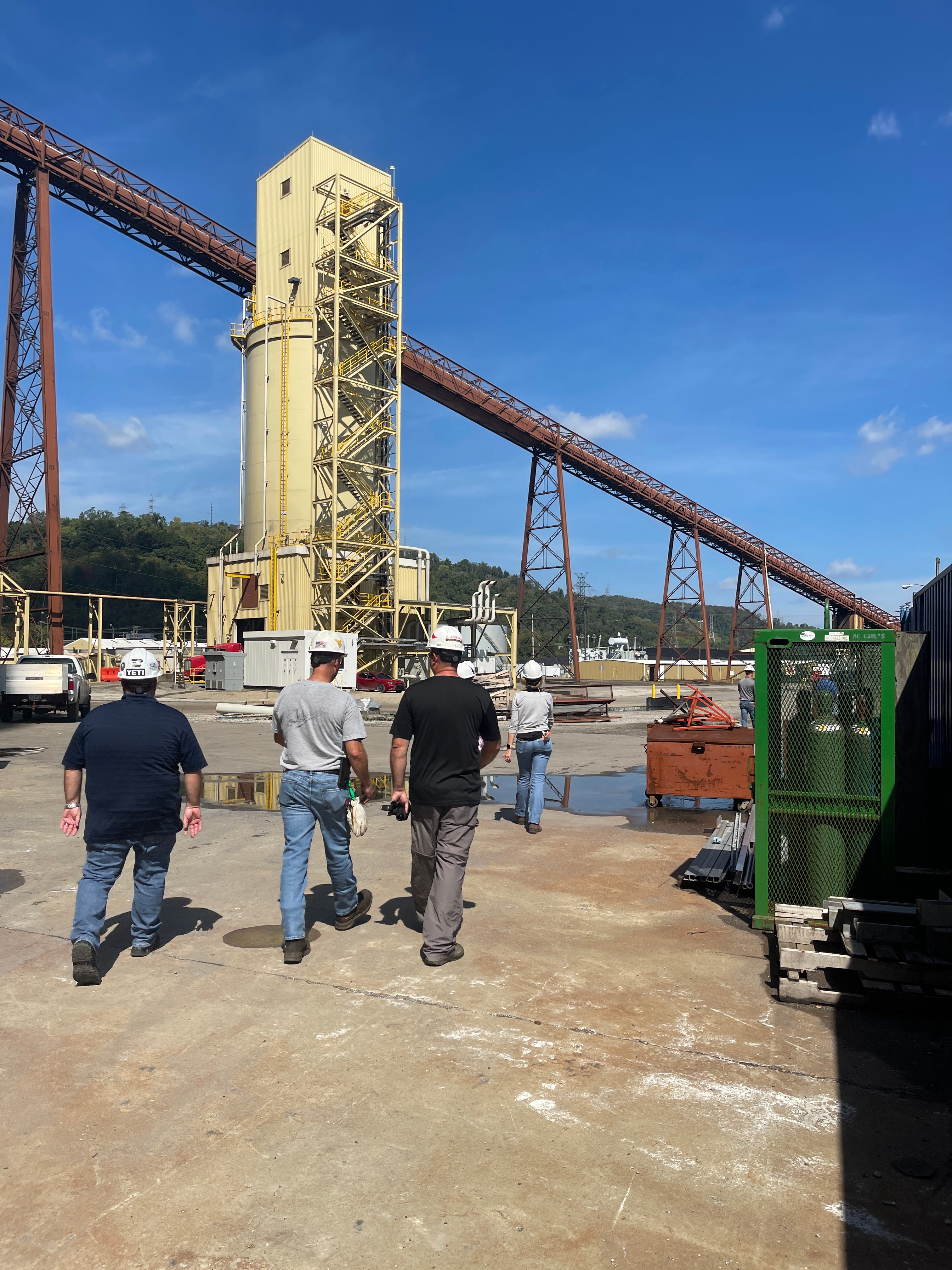 Members tour the power plant