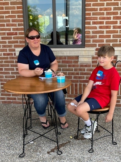 Member and son enjoy ice cream